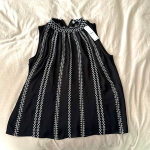 Size 2 WHBM sleeveless top.